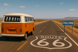 30〜50代男性がファッションをアップデートする挑戦を象徴する、Route66を走るオレンジのワゴンと“CHALLENGE”の小さな看板が並ぶ道路の写真